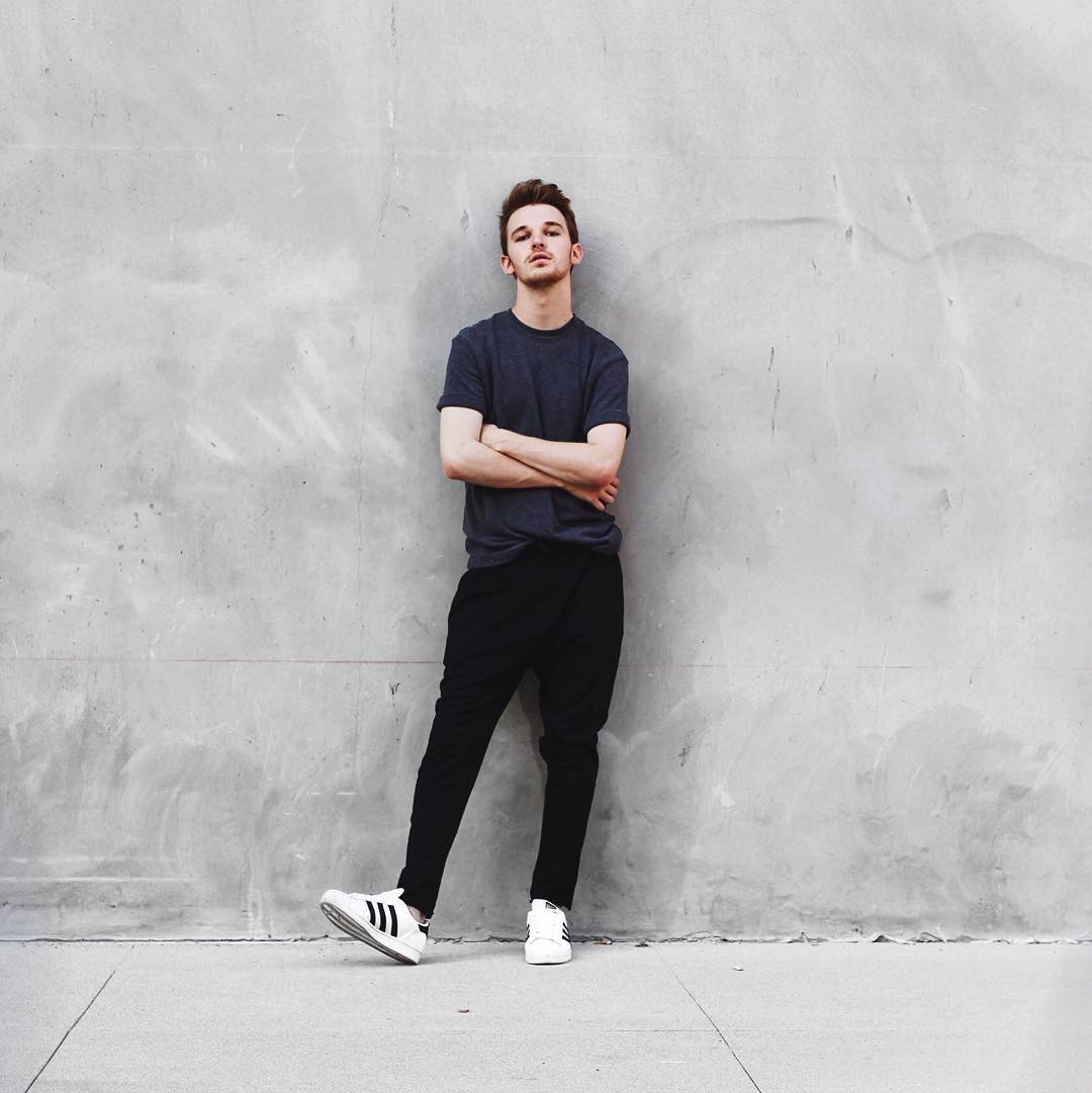 black pants and navy t-shirt outfit for men