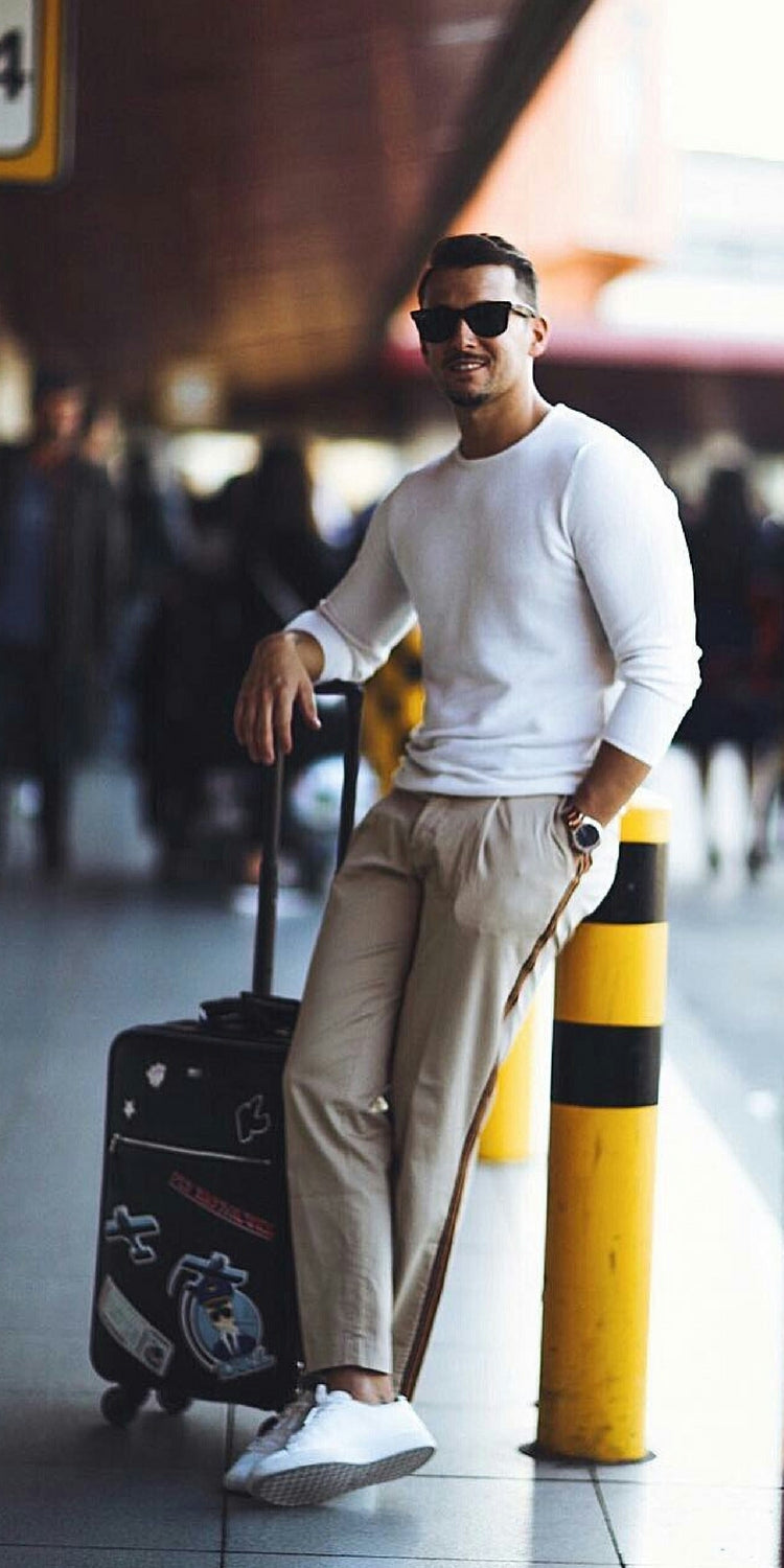 Beige chinos + White long-sleeve t-shirt + White sneakers